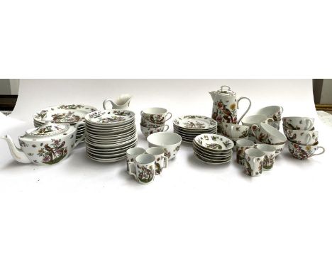 An Austrian part tea, coffee and breakfast service decorated with pheasants and butterflies amongst flowering trees and branc
