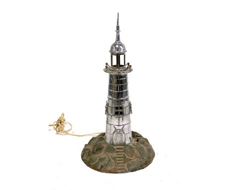Vintage chrome lighthouse table lamp, 44cmH, together with one other