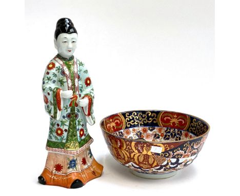 A Chinese ceramic figure, 37cmH; together with a bowl, 26cmD