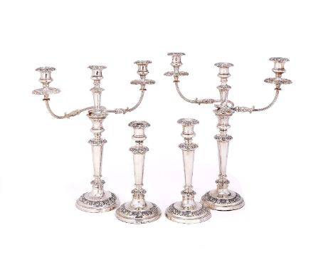 A composed set of four George IV/ William IV silver candlesticks, one a pair by Henry Wilkinson & Co., Sheffield 1837, the ot