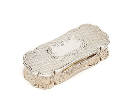 A Victorian shaped oblong table snuff box by Derry & Jones, Birmingham 1861, the cover centred by a vacant cartouche on an en