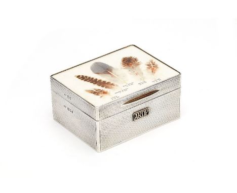 Asprey, a silver mounted rectangular cigarette box by Asprey & Co. Ltd, London 1936, the cover inset with named and dated bir