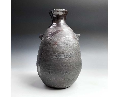 Janet LEACH (1918-1997)A St Ives Leach Pottery black stoneware vase poured with dark glaze and with twin lug handlesPersonal 