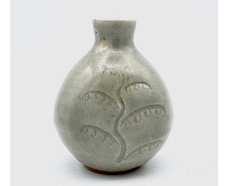 Bernard Howell LEACH (1887-1979)A St Ives celadon glazed stoneware bottle vase, incised with two willow treesScript BL initia