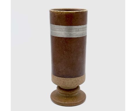 Robin WELCH, a cylindrical pedestal vase with silver glazed band, impressed pottery mark, height 19cm.The Personal Collection