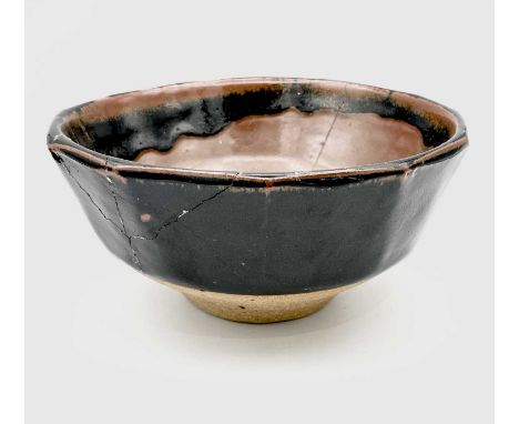Bernard Howell LEACH (1887-1979)A St Ives Pottery stoneware bowl by Bernard Leach with cut sides and tenmoku glazeImpressed s