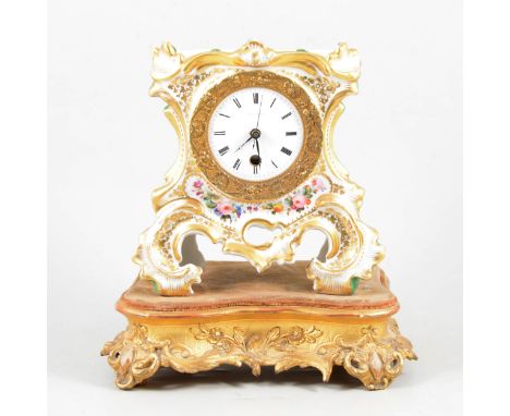 French porcelain mantel clock, white enamel dial, replaced movement, on a gilt composition plinth.