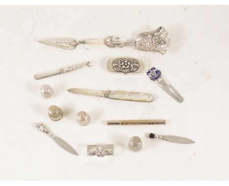Victorian folding fruit knife, with a silver blade, Sheffield 1892; silver novelty bookmarks; two contemporary silver pill bo