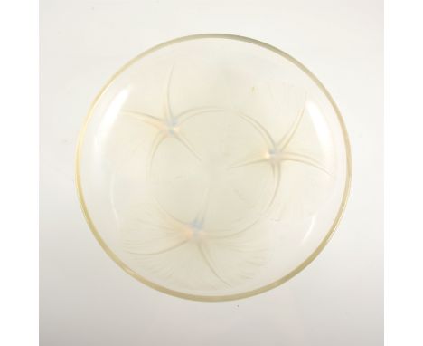 A René Lalique opalescent glass dish, 'Volubilis' design, introduced 1921, wheel engraved 'R Lalique France no 383', 21.5cm d