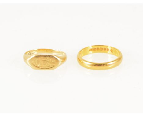 A 22 carat gold wedding band, 3mm wide D shape, approximate weight 3.2gms, ring size K, a gold signet ring probably 18 carat,