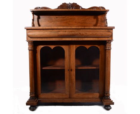 William IV rosewood chiffonier, shelf over single frieze drawer, two glazed panelled doors, width 101cm, height 132cm.