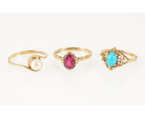 Three 9 carat yellow gold dress rings, one set with an oval synthetic ruby, one with an oval cabochon cut turquoise and anoth