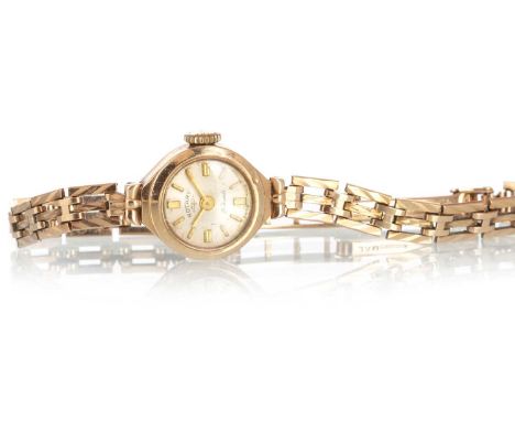 ROTARY NINE CARAT GOLD MANUAL WIND WRIST WATCH, the round dial with baton hour markers, 15mm case, on a nine carat gold brace