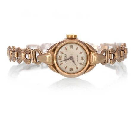 ROAMER NINE CARAT GOLD MANUAL WIND WRIST WATCH,  the round dial with Arabic and kite shaped hour markers, 16mm case, on a nin