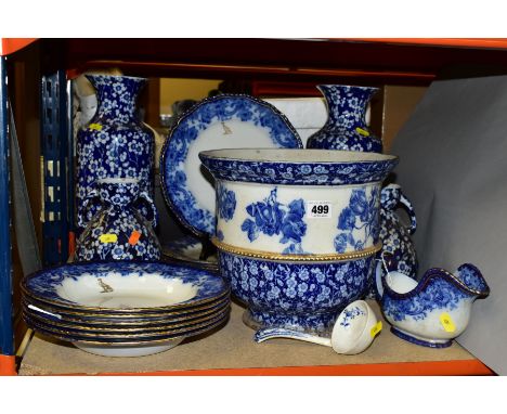 ROYAL DOLTON FLOW BLUE 'MELROSE' PATTERN DINNER WARES, comprising six soup bowls (four damaged), six dinner plates (five crac