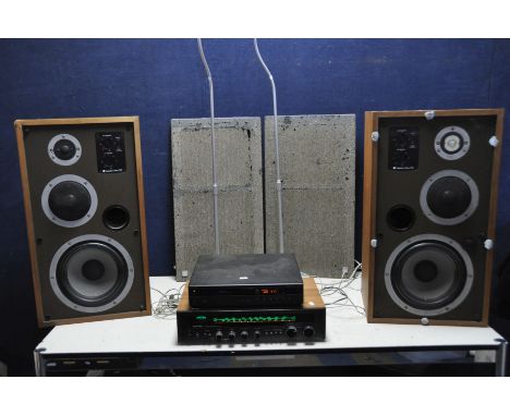 A VINTAGE ROTEL RX-402 STEREO RECEIVER, a Sharp CD player, a pair of modern satellite speaker stands and a pair of Celestion 