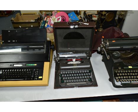 A CASED IMPERIAL GOOD COMPANION 3 PORTABLE TYPEWRITER, with a Bar-Lock desk typewriter and a Brother EM-85 electric typewrite