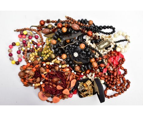 A BOX OF ASSORTED COSTUME JEWELLERY, to include various beaded necklaces, a yellow metal butterfly brooch, a wide two tone, w