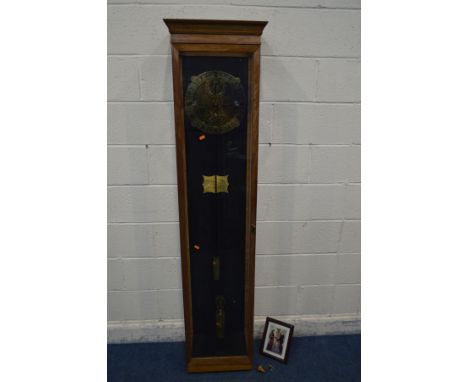 AN EIGHT DAY WEIGHT DRIVEN SKELETON CLOCK MOVEMENT, fitted in a glazed mahogany longcase, the 11 inch foliate fretwork dial w