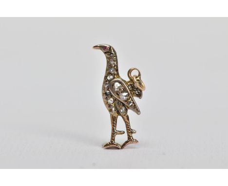 A VICTORIAN ROSE CUT DIAMOND AND RUBY SET PENDANT, in the form of a pheasant, embellished with rose cut diamonds and a circul