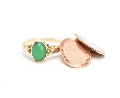 A SINGLE 9CT ROSE GOLD CUFFLINK AND A YELLOW METAL RING, the cufflink of an oval form, reeded rim with a plain polished centr