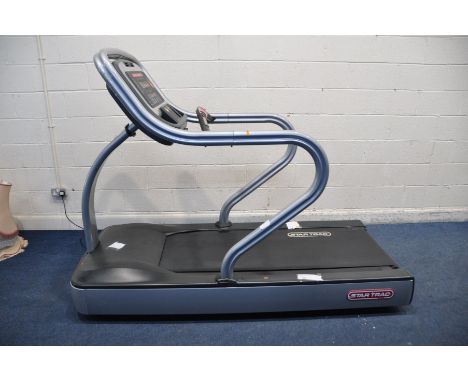 AN STARTRAC E-TRx TREADMILL with LED screen (not PAT tested as no cable supplied but tested for working order, speed adjustme