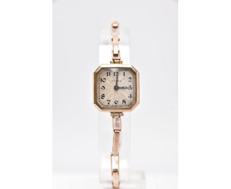 A LADIES 9CT GOLD 'ROLEX' WRISTWATCH, square engine turn dial signed 'Rolex', Arabic numerals, blue hands, within a square ca