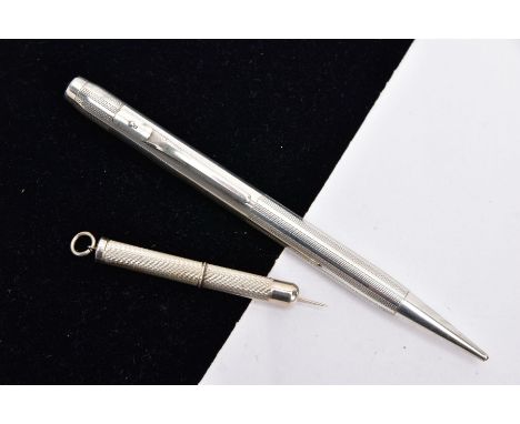 A SILVER PROPELLING PENCIL AND A SILVER CIGAR PIERCER, the propelling pencil with an engine turn design case, hallmarked 'Wal