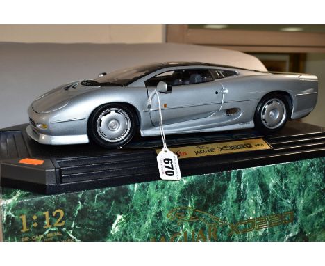 A BOXED MAISO JAGUAR XJ220 (1992), No 33201, 1/12 scale, appears complete and in very good condition except has some yellowin