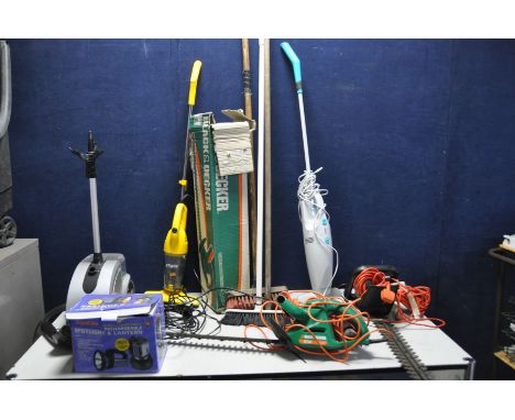 A COLLECTION OF HOUSEHOLD AND GARDEN ELECTRICALS including two Stick Vacuums, a Scott's Steamer (all three PAT pass and worki