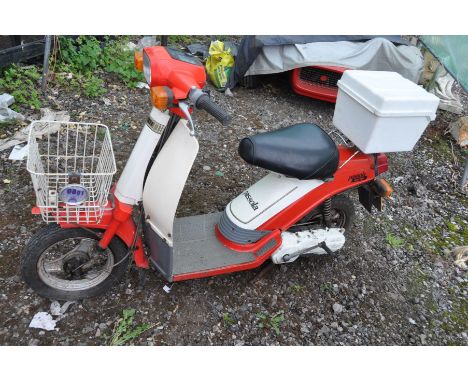 A 1983 YAMAHA PASSOLA 49cc MOPED in red and cream, no keys, no V5, first Registered 02/1983 under number BWD 358Y,  kick star