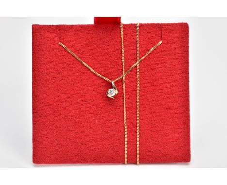 A 9CT GOLD DIAMOND PENDANT, from Goldsmiths Canadian Ice Diamond Collection, the brilliant cut diamond within a crossover set