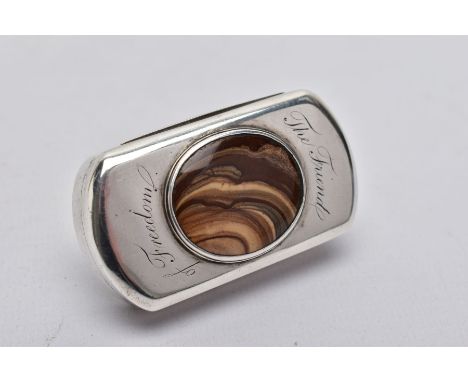 A GEORGE III SILVER SNUFF BOX, engraved 'The Friend of Freedom' around a brown inset hard stone, the gilt interior with maker