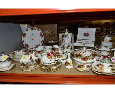 ROYAL ALBERT OLD COUNTRY ROSES PART DINNER SERVICE, comprising twelve dinner plates (six are seconds, six have no gilt to the