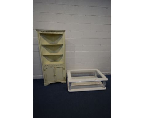 A VINTAGE BLUE TRAVELLING TRUNK, two suitcases, travelling bag, painted corner cupboard and a white glass top coffee table (6