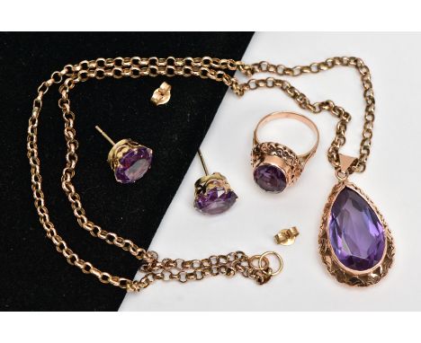 A SYNTHETIC COLOUR CHANGE CORUNDUM SUITE OF JEWELLERY, to include a large pear shape pendant, pear shape synthetic corundum m