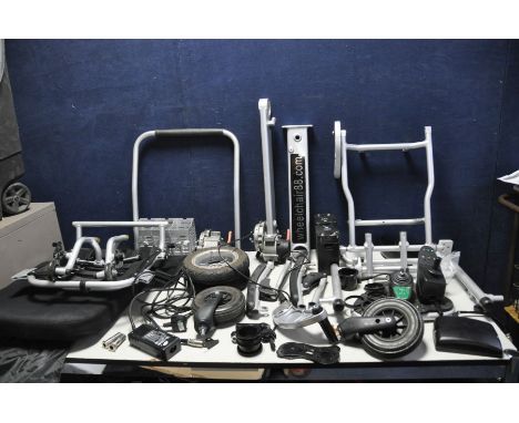 A DECONSTRUCTED FOLDAWHEEL ELECTRIC WHEELCHAIR in a box (please see pics for contents - sold as spares or repairs as we have 