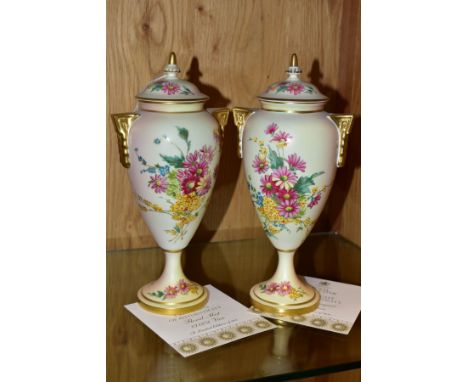 A PAIR OF LATE 20TH CENTURY ROYAL WORCESTER BLUSH IVORY LIMITED EDITION COVERED VASES, 'Floral Mist' and 'Golden Bouquet' No 