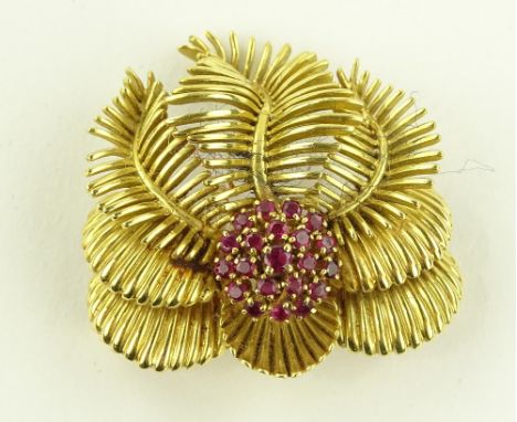 A 1950s 18ct gold ruby set leaf design brooch, hallmark for 1958, width 37mm, 25g.