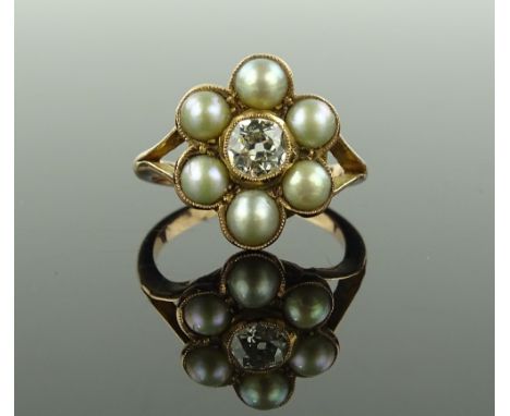 An unmarked gold pearl and diamond cluster ring, total diamond content approx 0.4cts, colour J-K, clarity approx VS1-VS2, set