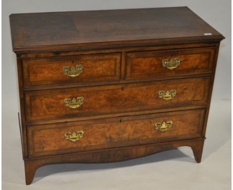 A 19th century walnut chest of 2 long and 2 short drawers, crossbanded drawer fronts and bracket feet, width 3'6", height 2'8