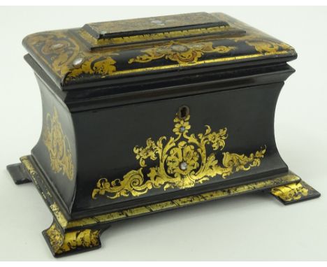 A Victorian papier-mache tea caddy, concave sides with allover gilded and mother of pearl inlaid decoration and inner lid, wi