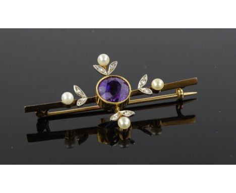 An Edwardian unmarked gold amethyst, diamond and pearl set cross brooch, length 43mm.