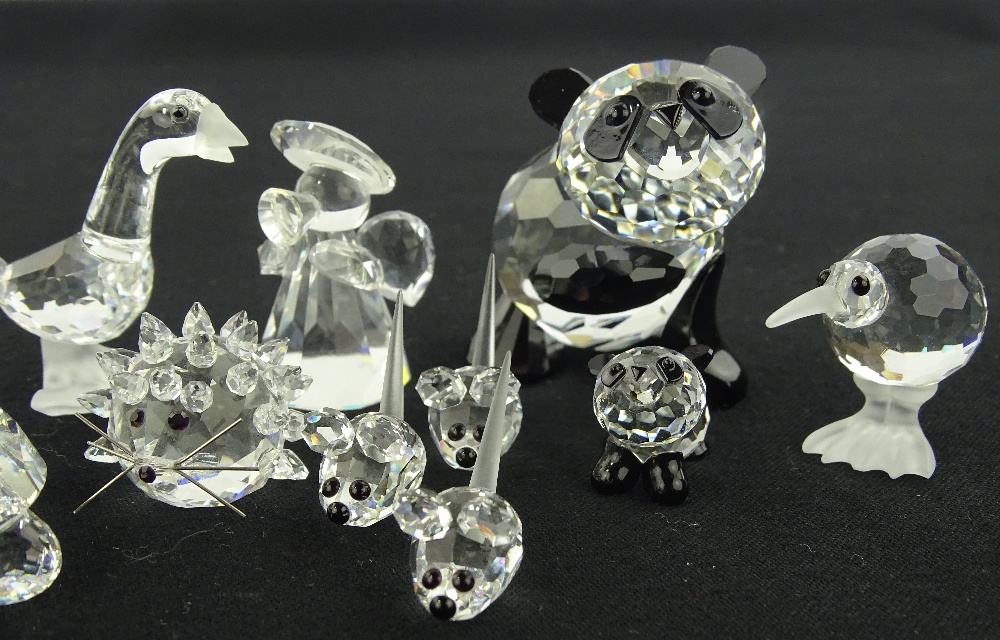 A group of Swarovski crystal animals, boxed, (12).