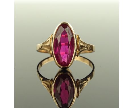 A Russian 14ct gold synthetic ruby set ring, setting height 15mm, size U.