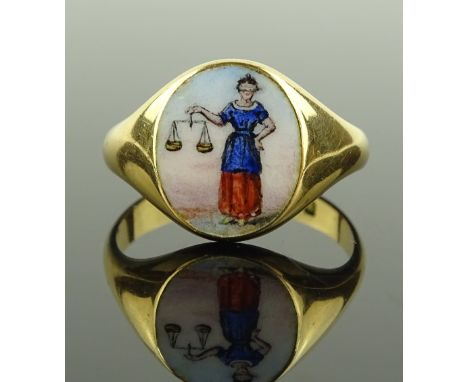 An Edwardian 18ct gold signet ring with painted enamel panel depicting Justice, makers marks K B S P, Birmingham 1906, settin