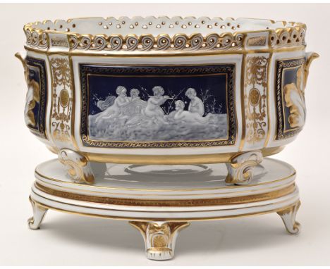 Simulated Pate-Sur-Pate panel oval jardiniere on stand, of classical form with gilt detailing, height 25cm.