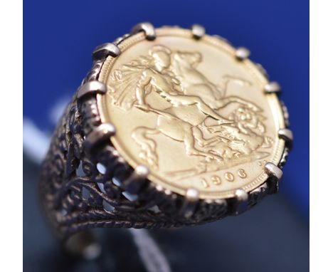 An Edward VII gold half sovereign, 1906, in 9ct. yellow gold ring mount, ring size S, 9.4grms.