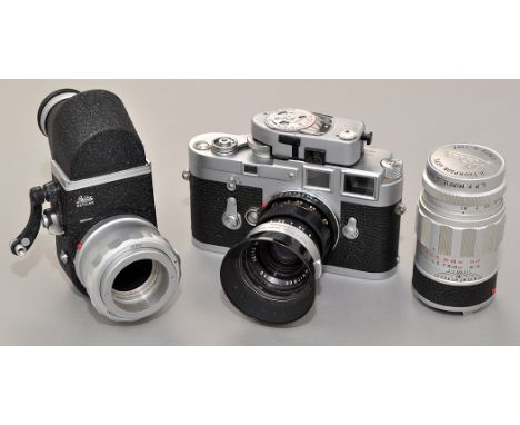 A Leica M3 rangefinder camera serial no. 1014941 with Leica-meter MR, in brown leather ER case; together with a Summicron 50m