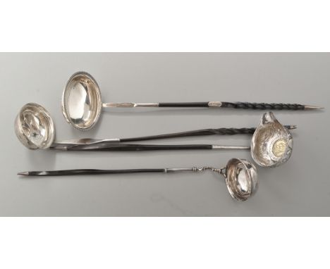 A George III silver and stained whalebone toddy ladle, probably by Peter and Ann Bateman, London 1793, oval bowl, beaded bord